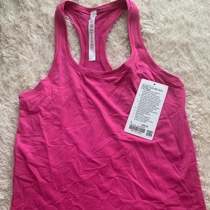 Lululemon SONIC PINK Racerback tank!! Size 6 and race length! Perfect condition!